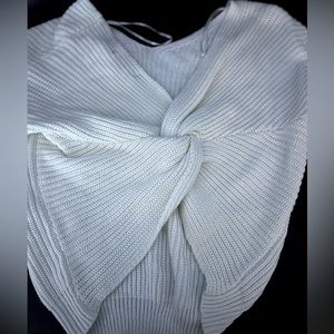 Worn maybe once. The side with the twist is the back of the shirt.